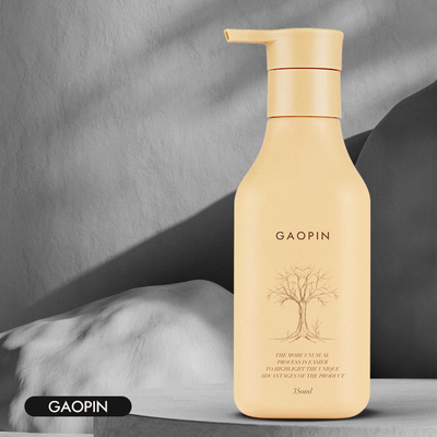 le shampooing 350ml en plastique met l'emballage en bouteille cosmétique de lotion avec la pompe d'or