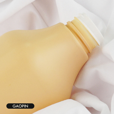 le shampooing 350ml en plastique met l'emballage en bouteille cosmétique de lotion avec la pompe d'or